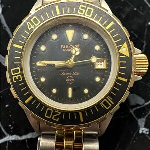 Bulova Marine Star Black and Gold Dive Watch. Unused. New, old stock.